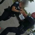 'Don't ever f—ing touch me': Cop who grabbed female officer by throat for pulling him off handcuffed suspect still won't face a jury