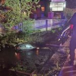 Two treated for minor injuries after car plunges into Dracut’s Beaver Brook